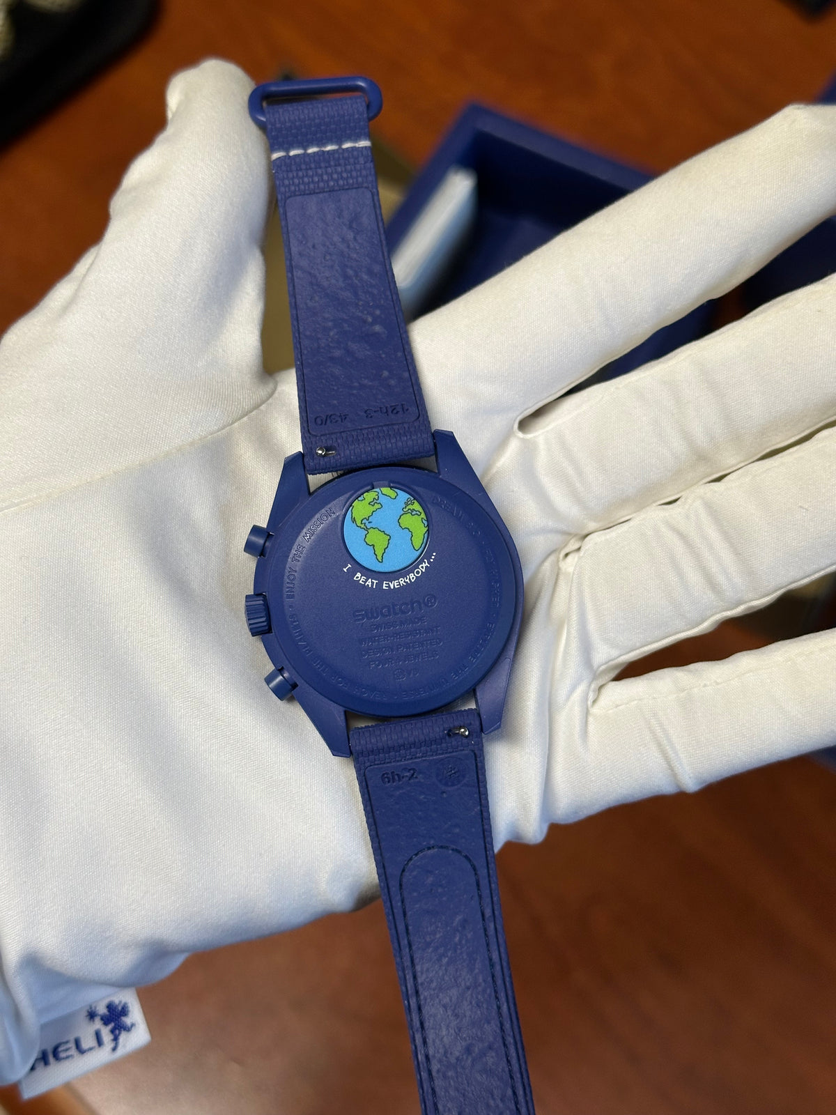 Swatch x Omega mission to earthphase moonshine gold snoopy