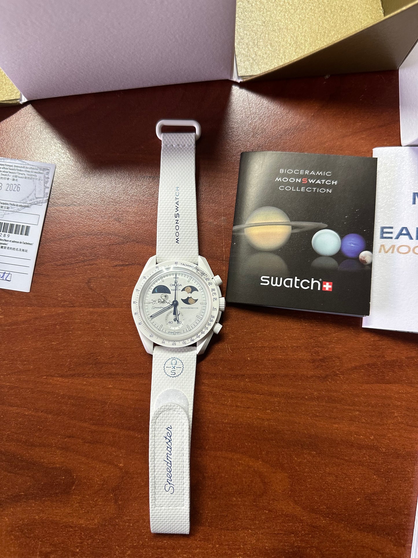 Swatch x omega mission to earthphase moonshine gold