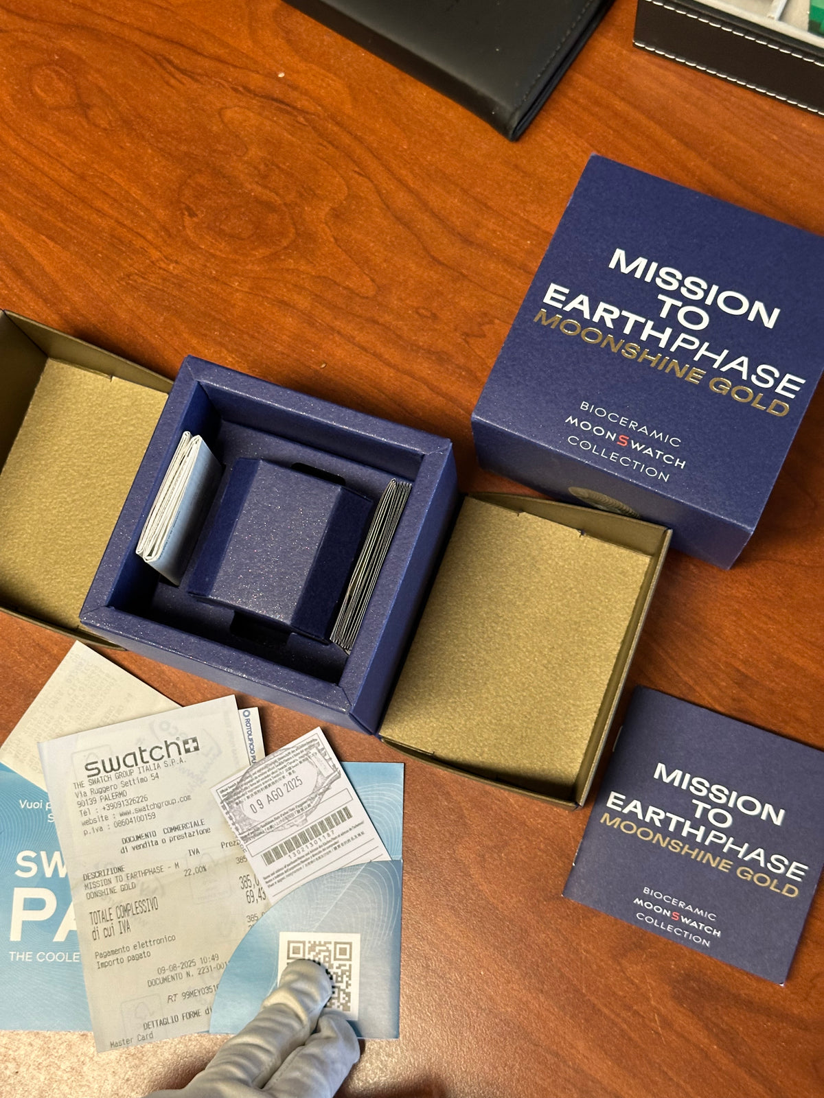 Swatch x Omega mission to earthphase moonshine gold snoopy