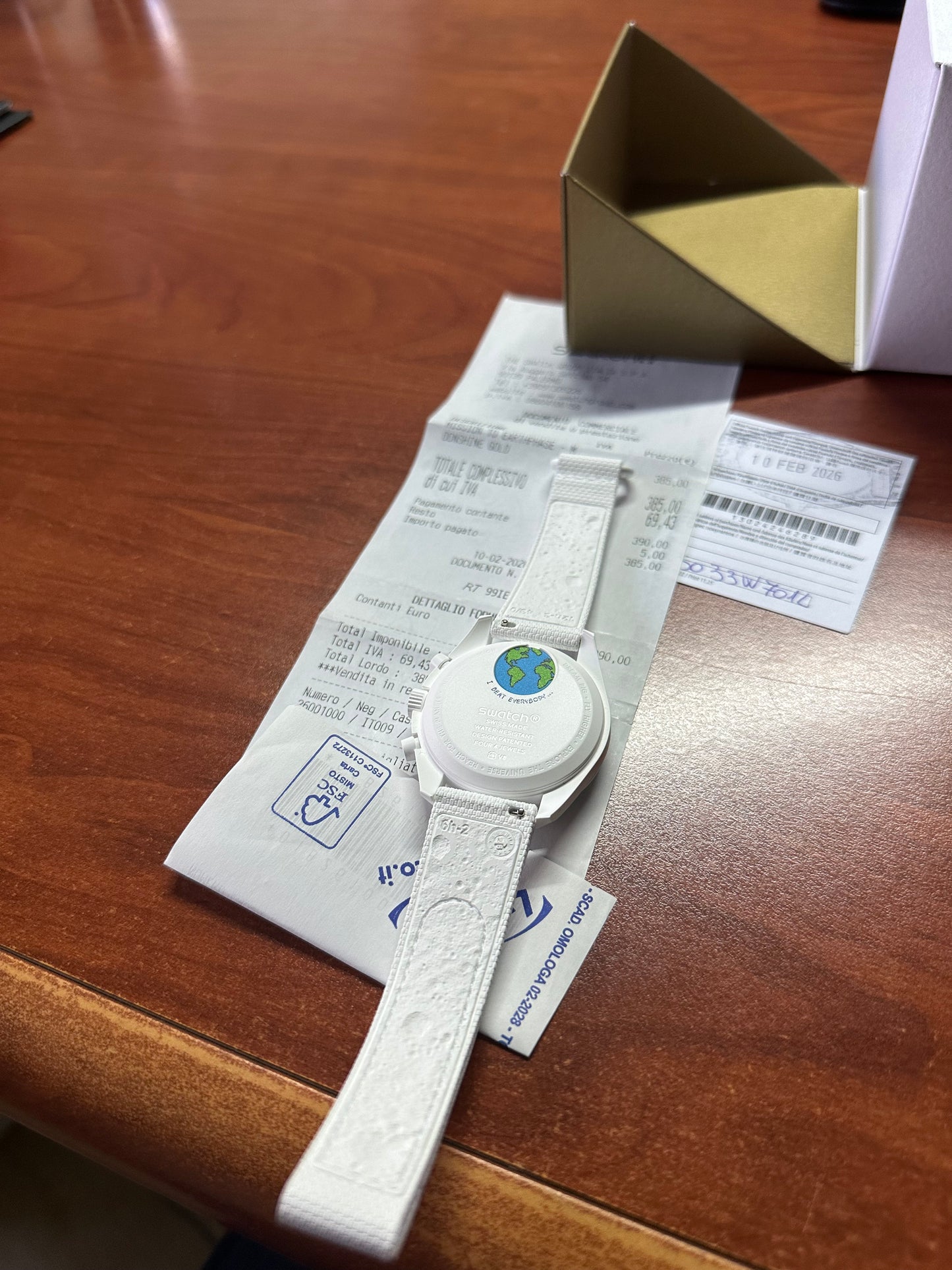 Swatch x omega mission to earthphase moonshine gold