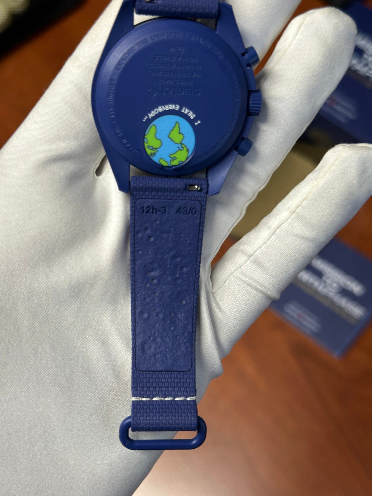 Swatch x Omega mission to earthphase moonshine gold snoopy